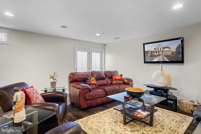 living room featuring dark hardwood / wood-style flooring