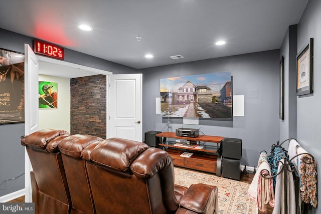 cinema room featuring wood-type flooring