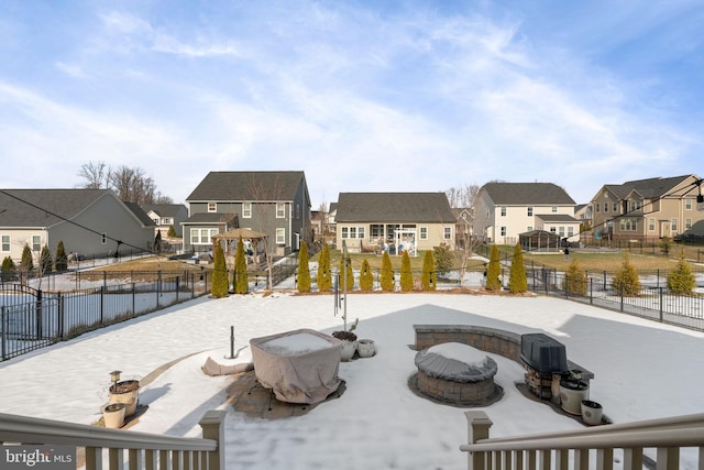 exterior space featuring an outdoor fire pit