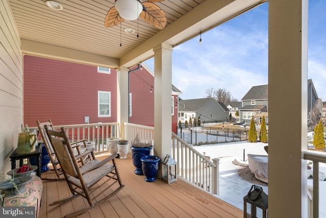 wooden deck with ceiling fan