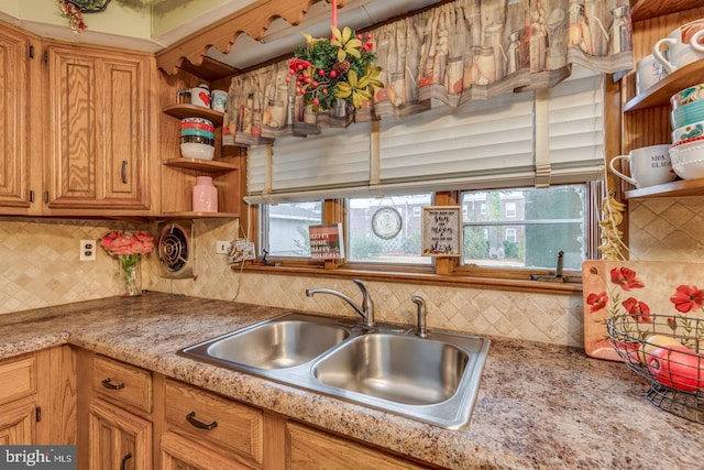 kitchen with sink and backsplash