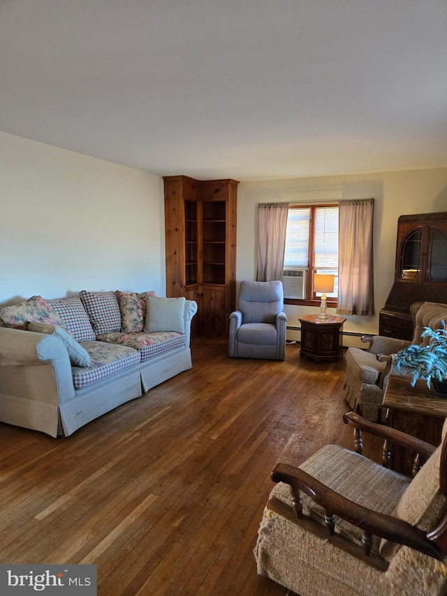 living room with dark wood-style floors and baseboard heating