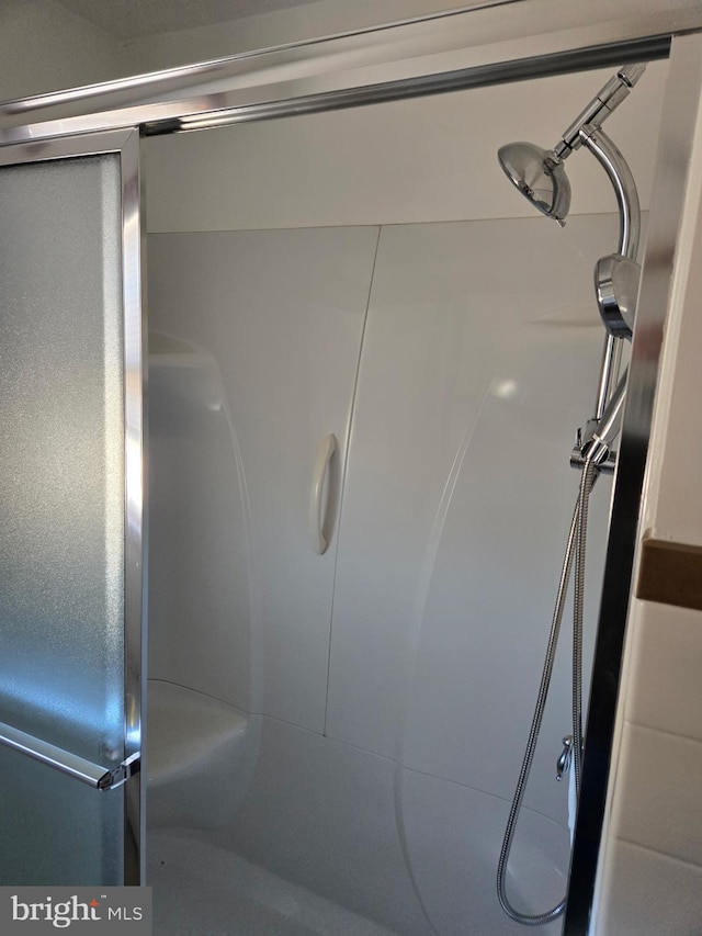 full bath featuring a stall shower