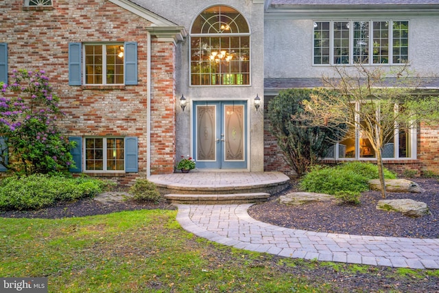 doorway to property featuring french doors