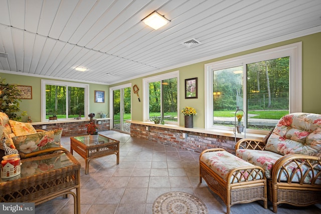 sunroom with wooden ceiling