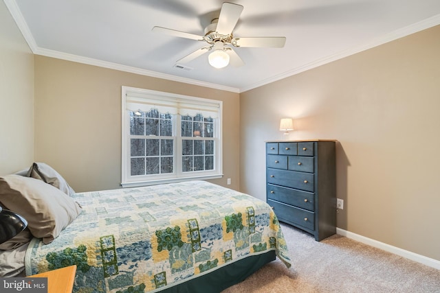 bedroom featuring visible vents, ceiling fan, baseboards, ornamental molding, and carpet flooring