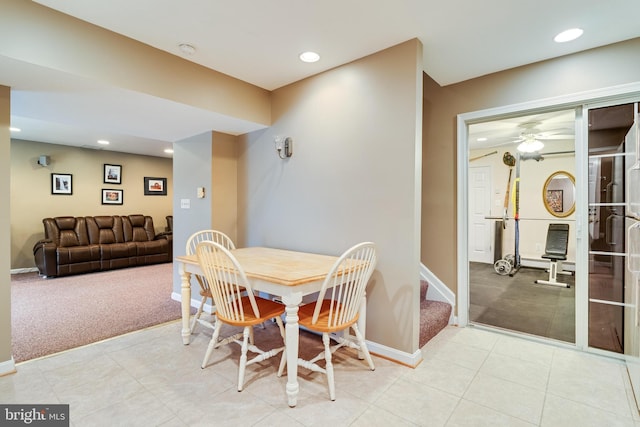 dining area featuring stairway, carpet, baseboards, recessed lighting, and tile patterned floors