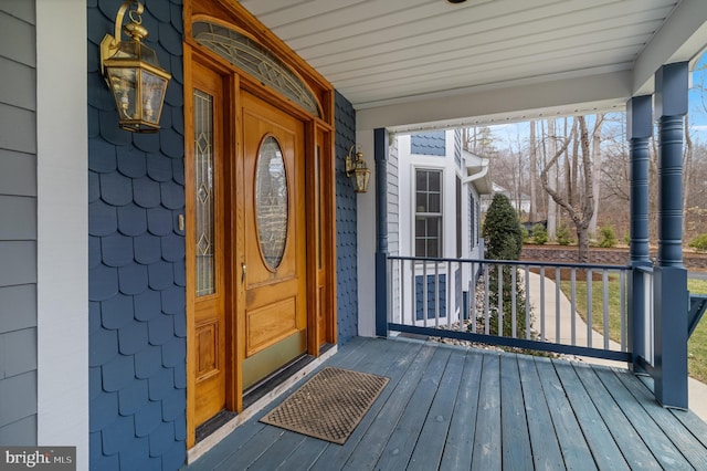 doorway to property with a porch