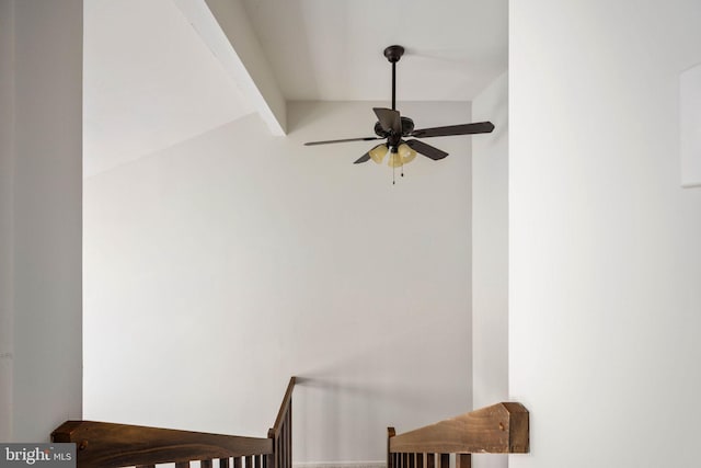 details with ceiling fan and beamed ceiling