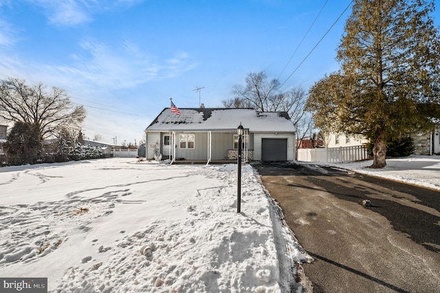 single story home with a garage