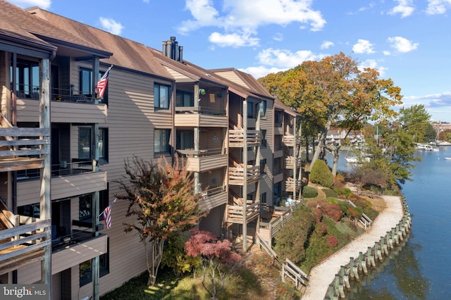 view of building exterior with a water view