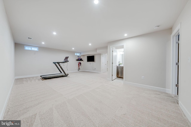 workout area with baseboards, carpet flooring, visible vents, and recessed lighting