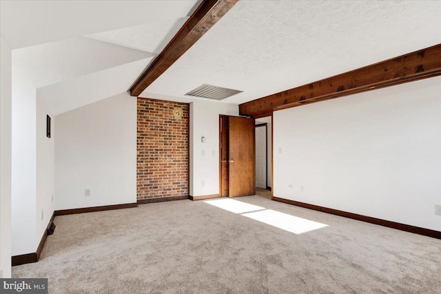 bonus room featuring light colored carpet, lofted ceiling with beams, and a textured ceiling