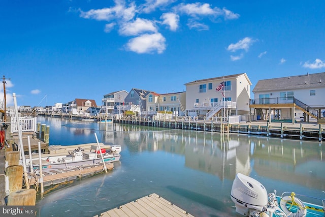 dock area featuring a water view