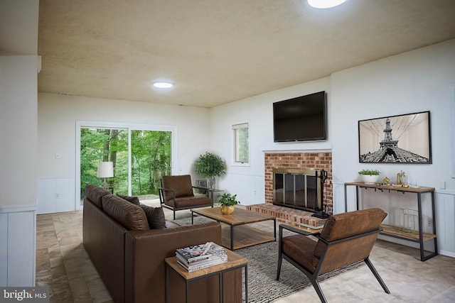 living room featuring a fireplace