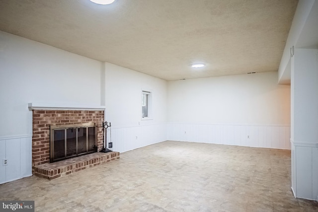 unfurnished living room featuring a fireplace