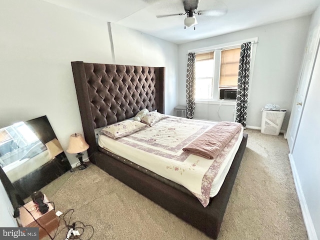 bedroom with ceiling fan and carpet flooring