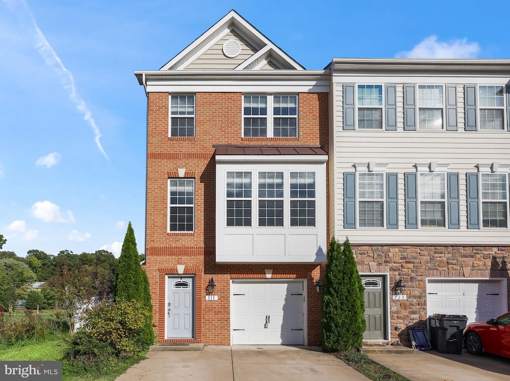 view of property featuring a garage