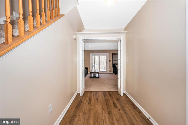 hall with dark hardwood / wood-style flooring