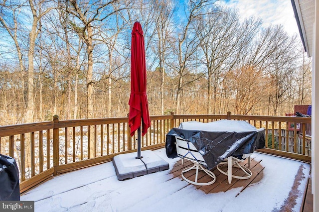 view of snow covered deck