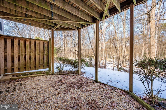 view of yard layered in snow