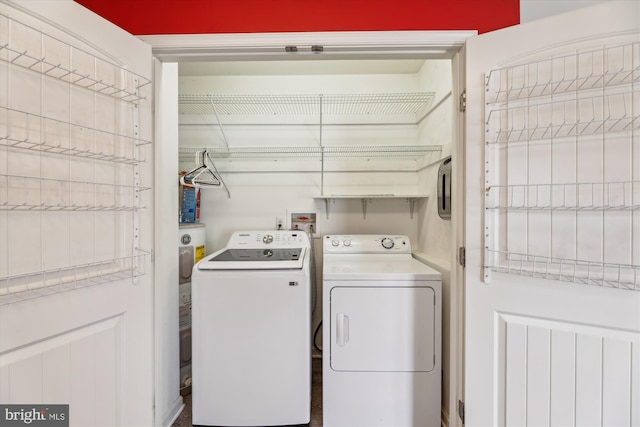 laundry area with washer and clothes dryer