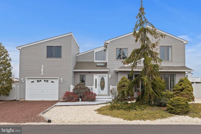 view of front of property featuring a garage