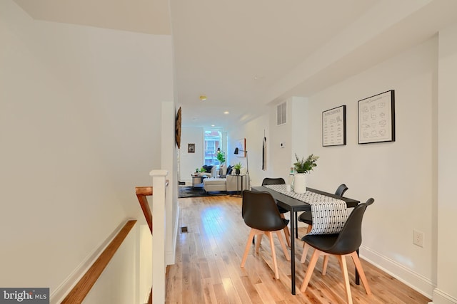 dining room featuring light hardwood / wood-style flooring