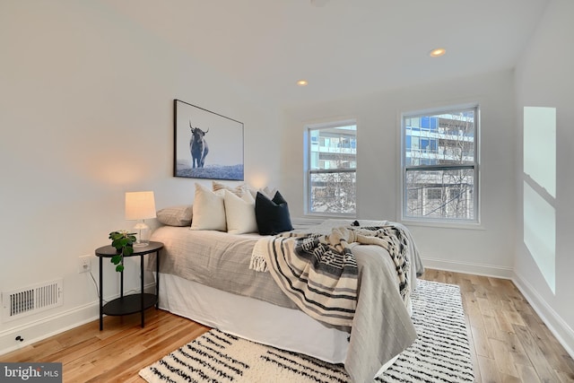 bedroom with light wood-type flooring