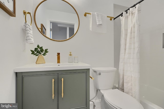 full bathroom featuring vanity, shower / bathtub combination with curtain, and toilet