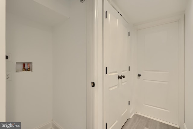 hallway featuring light wood-type flooring