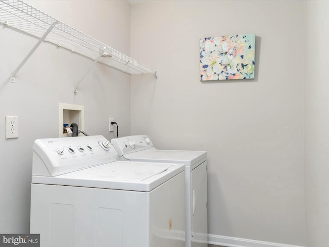 laundry area featuring washer and clothes dryer