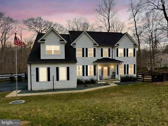 traditional-style home with a yard