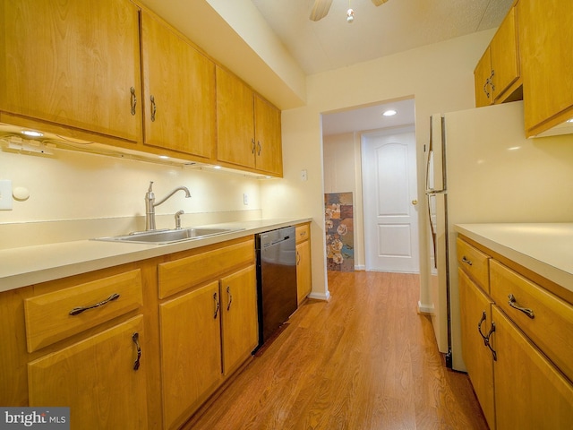 kitchen with black dishwasher, white refrigerator, light hardwood / wood-style floors, sink, and ceiling fan