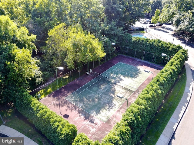 exterior space with tennis court