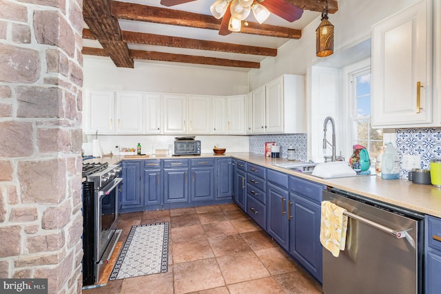 kitchen with pendant lighting, blue cabinets, white cabinetry, sink, and stainless steel appliances