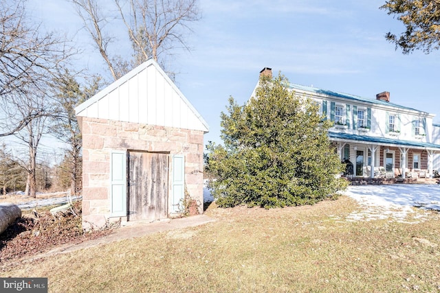 exterior space with a yard and covered porch