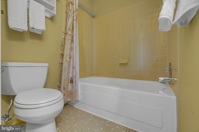 bathroom with shower / bath combo, tile patterned floors, and toilet