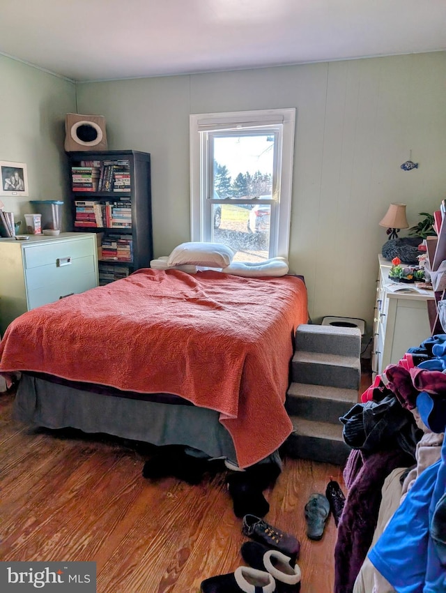 bedroom featuring hardwood / wood-style floors