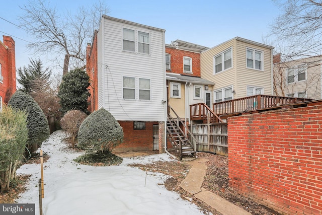 view of snow covered property