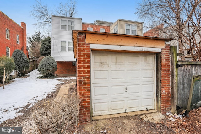 view of snow covered garage