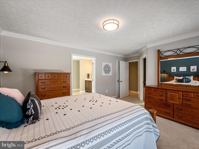 bedroom with light carpet, a textured ceiling, ensuite bath, and crown molding