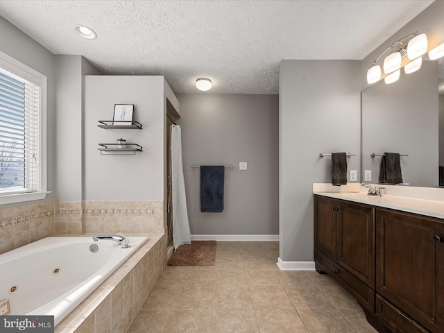 bathroom featuring vanity, shower with separate bathtub, tile patterned floors, and a textured ceiling