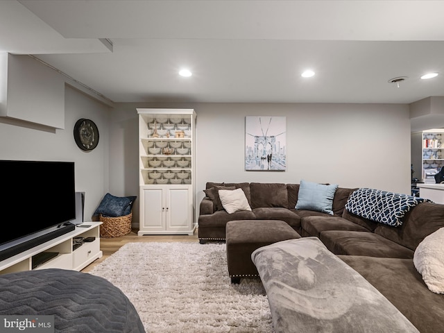 living room with wood-type flooring