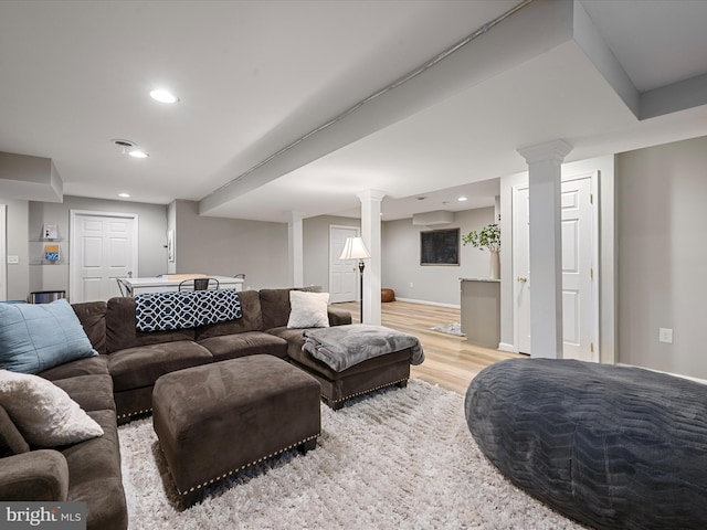 living room with light hardwood / wood-style flooring