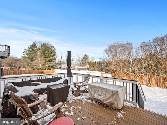 view of snow covered deck