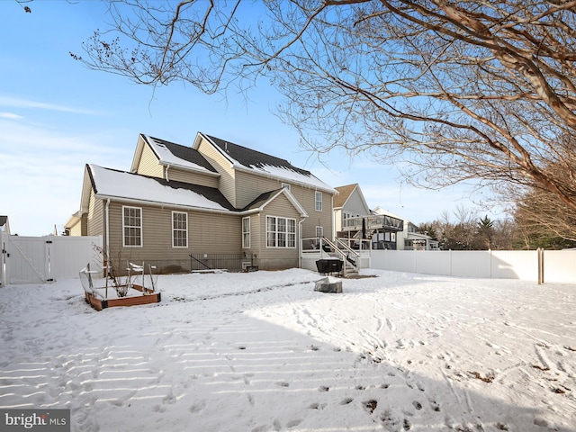 view of snow covered property