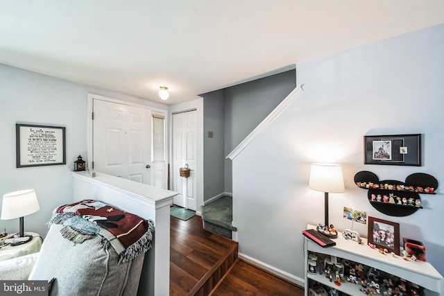 foyer entrance with dark wood-type flooring