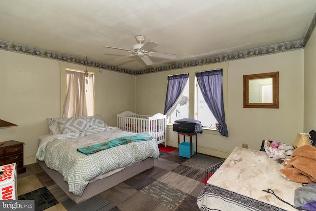 bedroom featuring ceiling fan