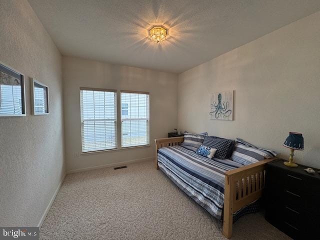 bedroom featuring carpet flooring